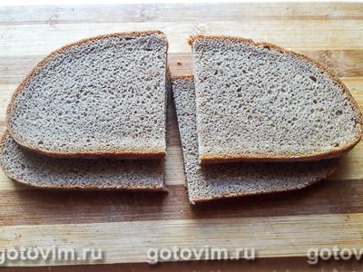 Бутерброды с селедкой на черном хлебе с горчичным маслом